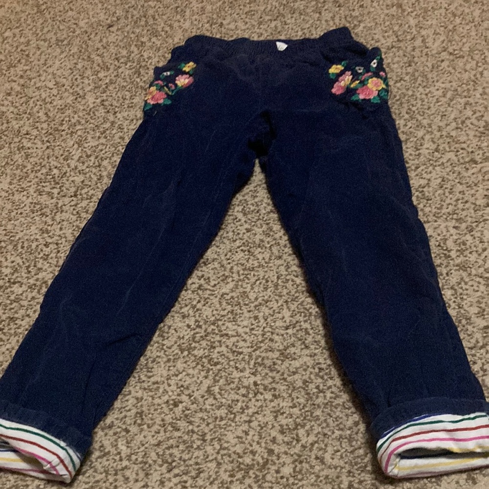 Girls’ lined corduroy pants in navy blue.